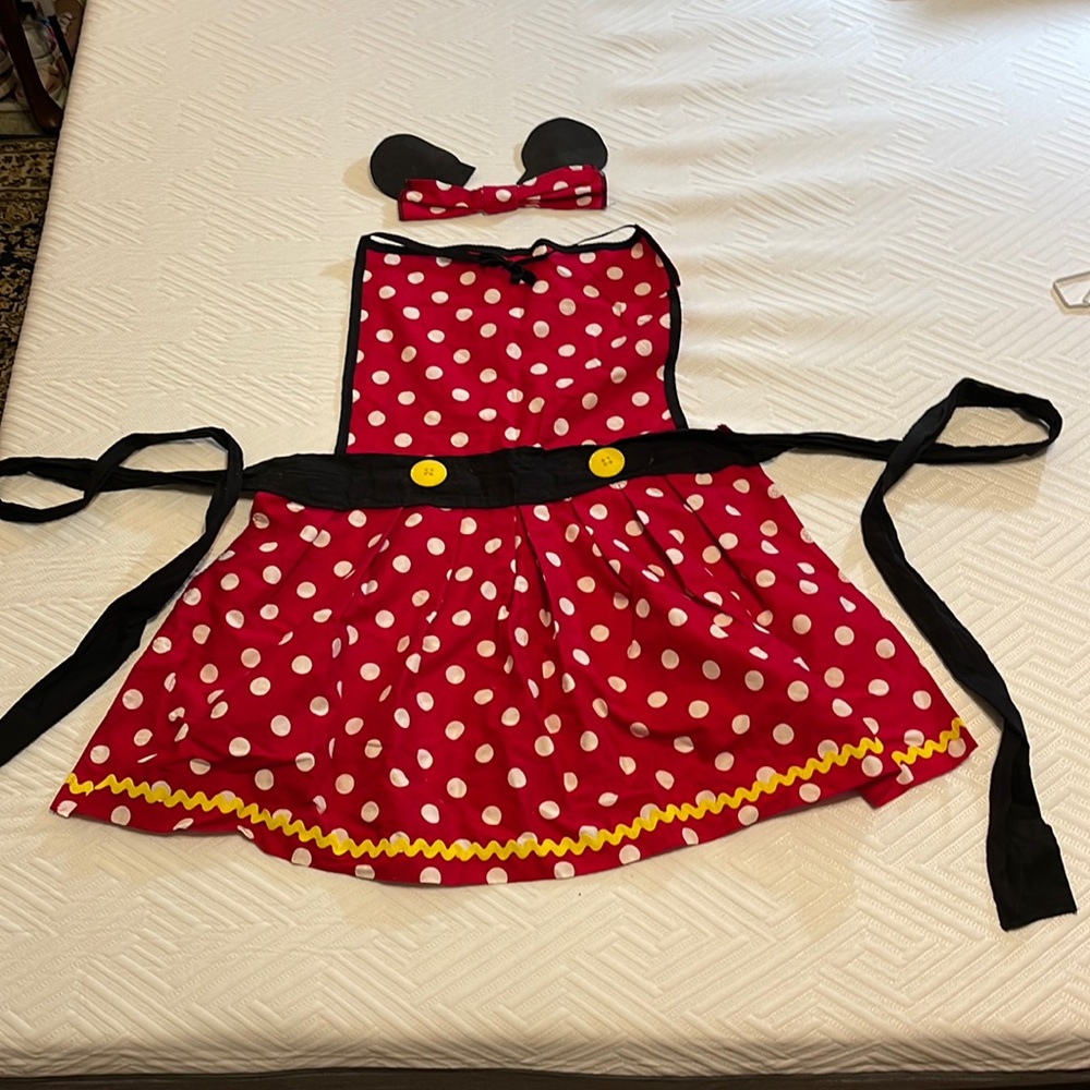 Minnie mouse, homemade apron and ears, and Bow